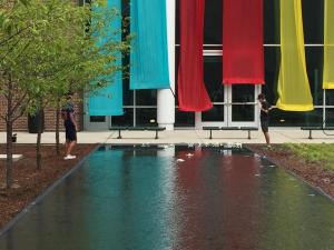 Banner Installation with Reflection Pond by Joan Farrenkopf 