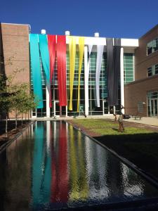 Banner Installation with Reflection Pond by Joan Farrenkopf 